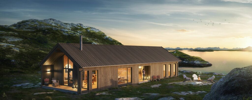 Moderne hytte i nordisk stil fra Jora Bygg, plassert i naturskjønt landskap ved vannet i Norge. Store vinduer, trepanel og bålplass i forgrunnen gir en lun atmosfære ved solnedgang.