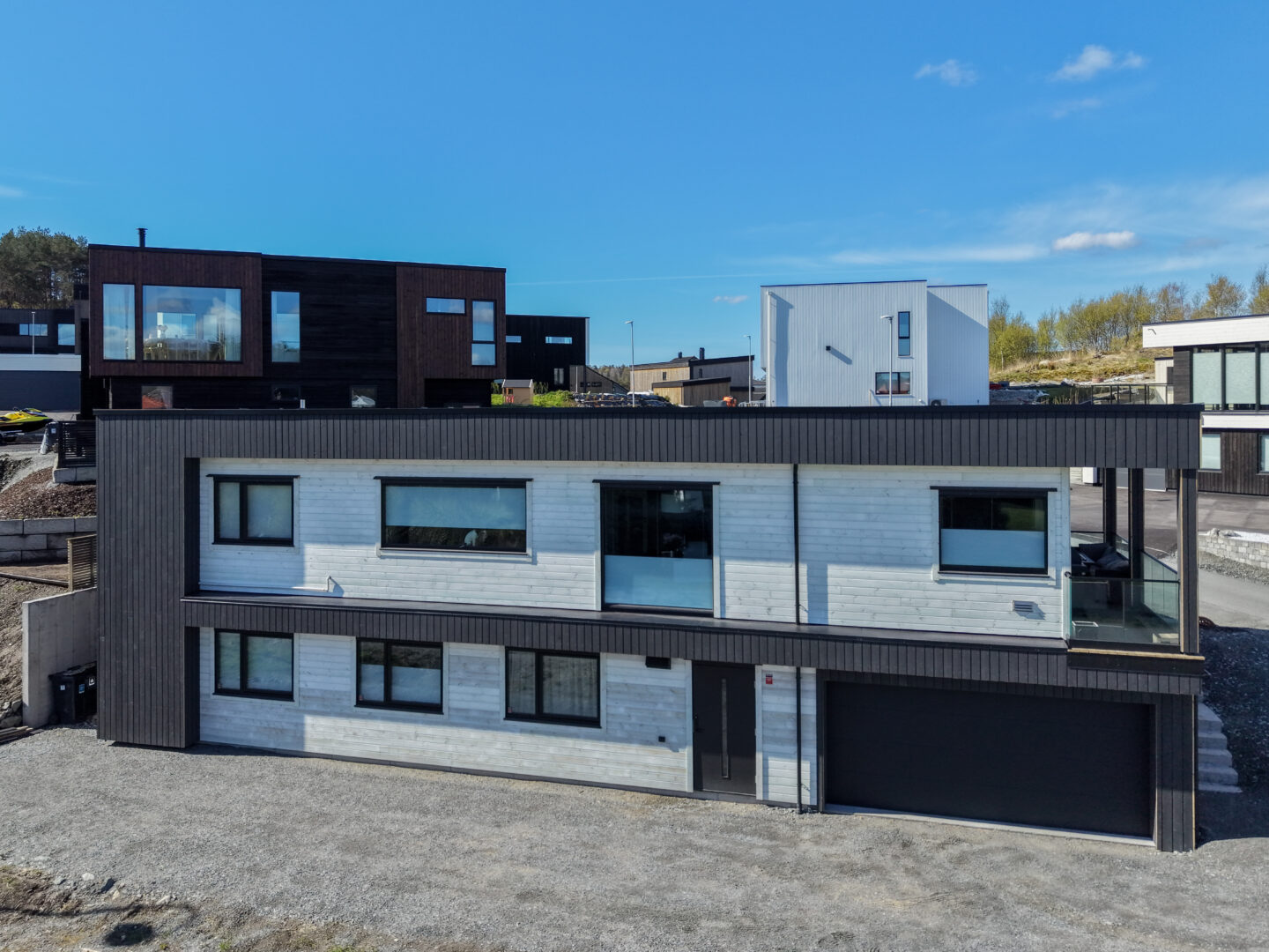 Bilde av fasade på funkishus bygget av Berge Hus på Spanne i Karmøy