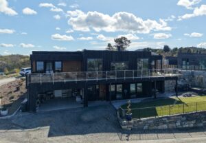 Bilde av fasade på funkishus bygget av Berge Hus i Sveio